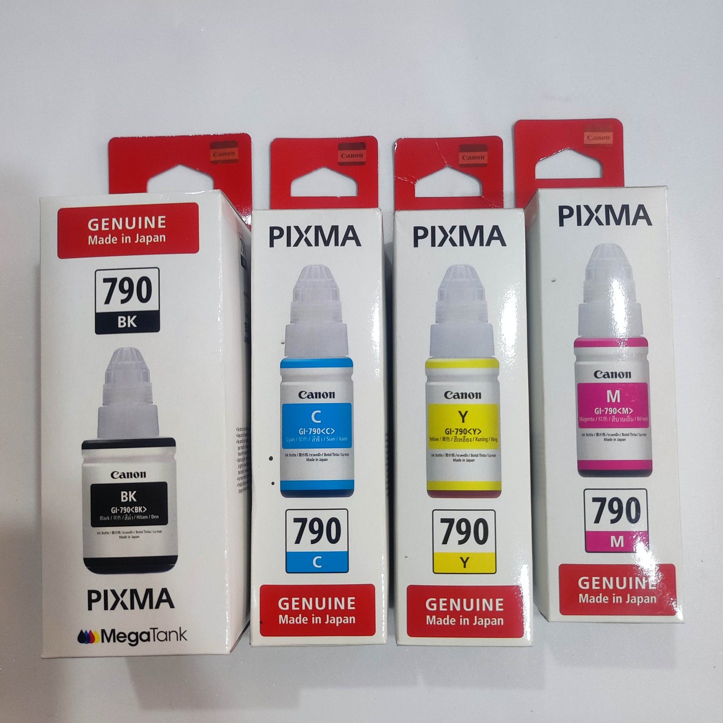 Canon GI-790 Ink Set | Black + Cyan + Yellow + Magenta | Compatible with G1000, G1010, G2010 & More