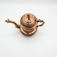 Nakchdaar copper unique oil keeper used to contain oil .