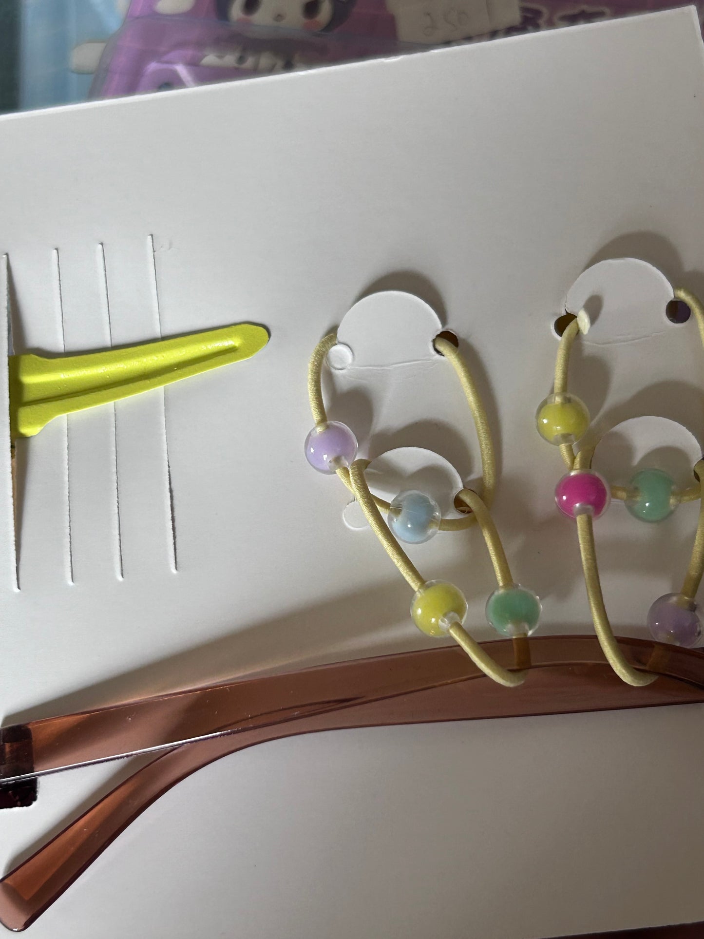 Set of glasses, pin and rubbers for kids