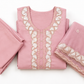 Blush pink dreams stitched with elegance and charm.